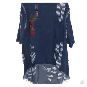 Hi- lo jean material distressed shirt. Never worn.